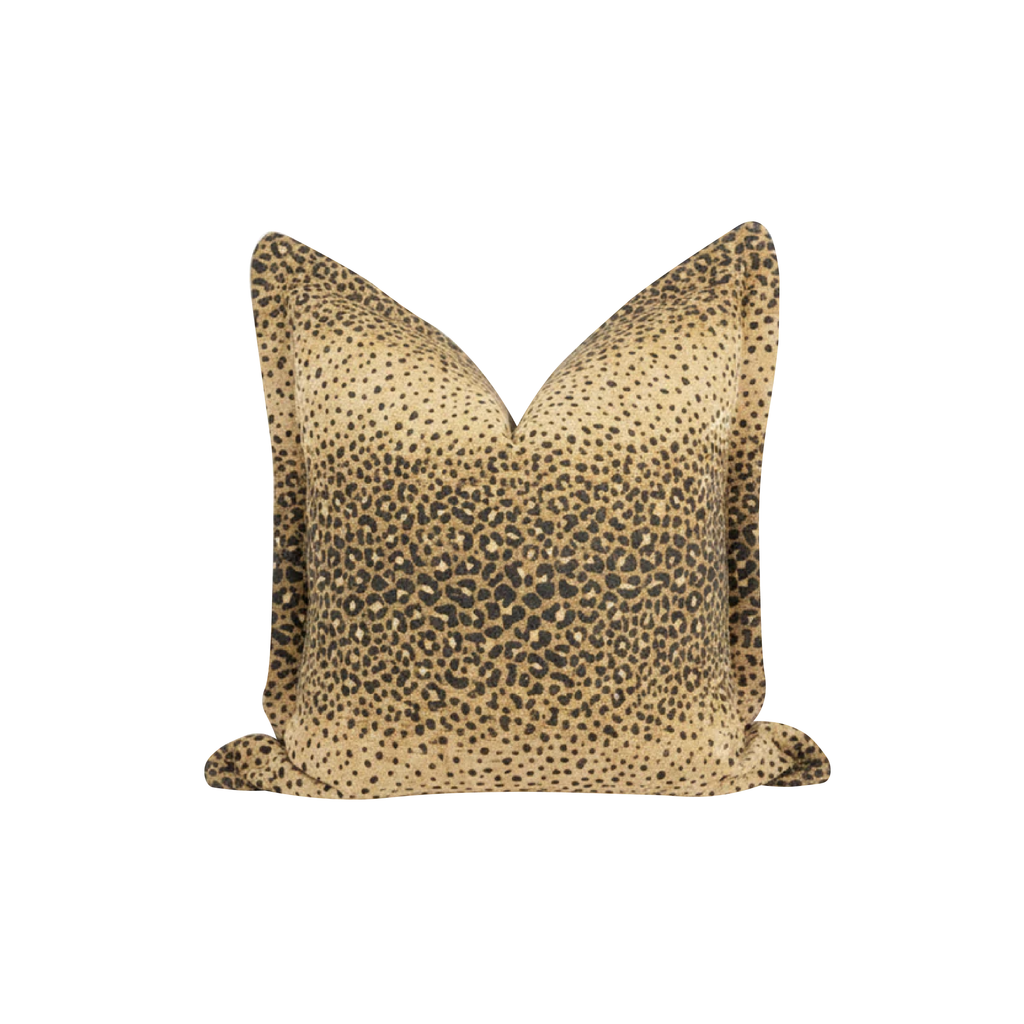 Leopard print pillow on a white background